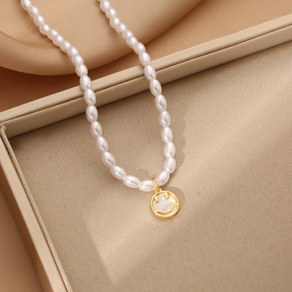 Korean version of fashion cute smiley face high sense natural baroque pearl necklace women's niche ins smile tide jewelry