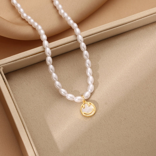 Korean version of fashion cute smiley face high sense natural baroque pearl necklace women's niche ins smile tide jewelry