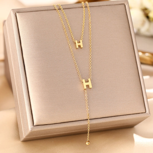 Internet celebrities with the same titanium steel fashion letter h necklace light luxury niche double-layer clavicle chain women's double H fringed versatile necklace