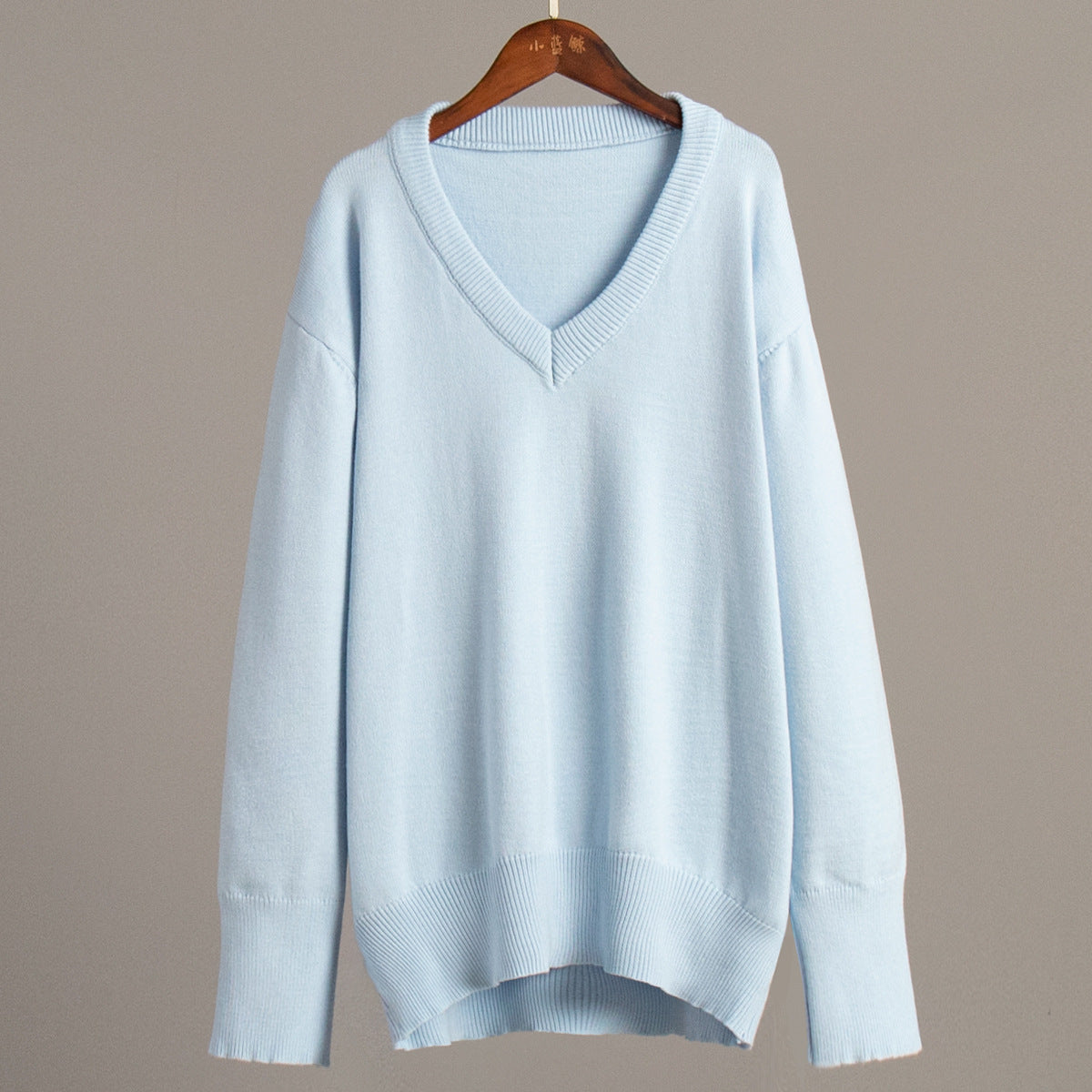 V-neck sweater women's autumn and winter European and American solid color versatile pullover sweater loose knitted sweater