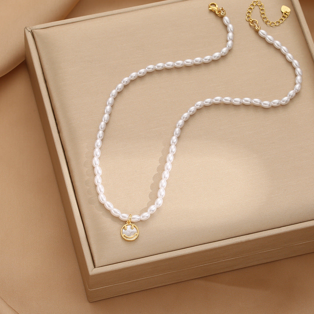 Korean version of fashion cute smiley face high sense natural baroque pearl necklace women's niche ins smile tide jewelry
