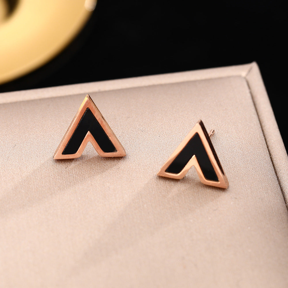 Korean version of temperament black V-shaped titanium steel stud earrings women's simple letters rose gold earrings small ear jewelry does not fade