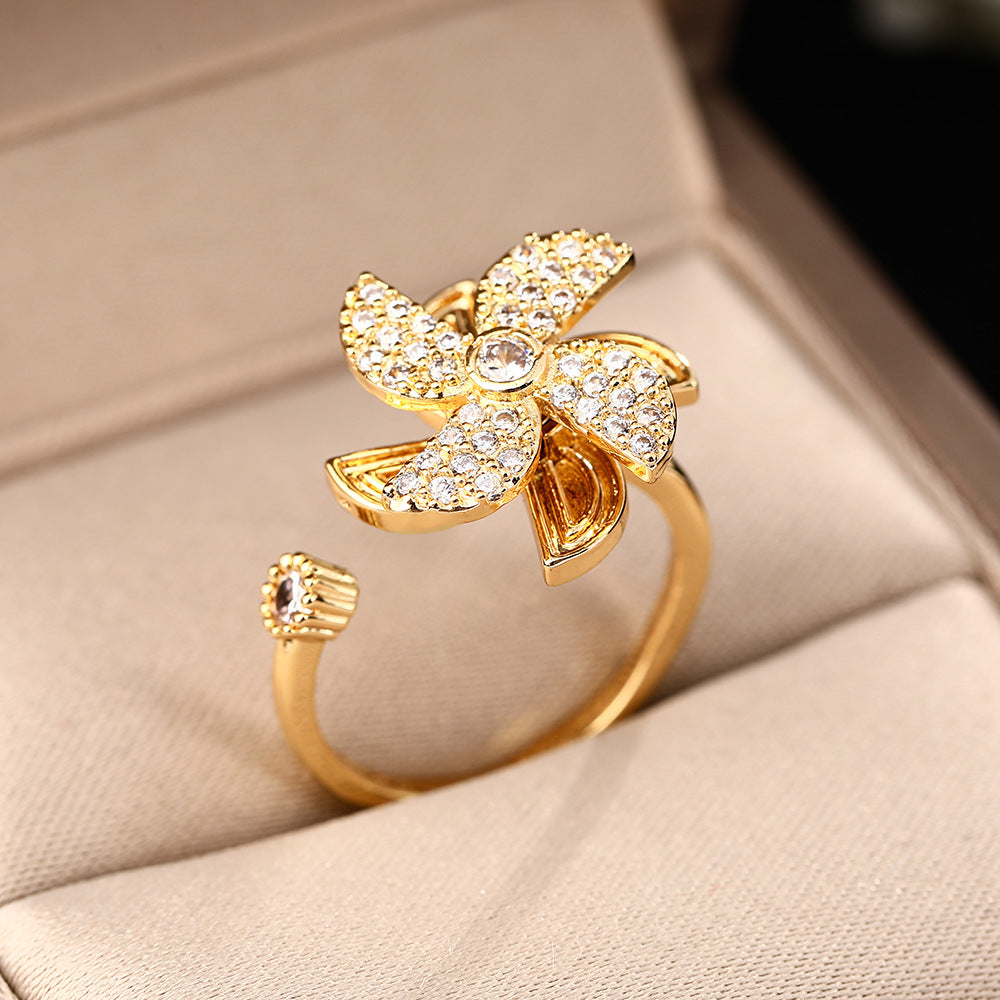 Korean version of Internet celebrity creative windmill rotating rings female niche design micro zircon opening high sense ring jewelry