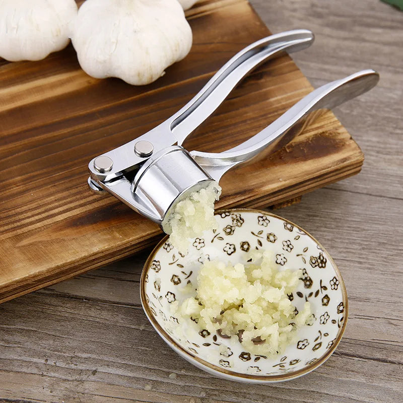 Manufacturer    Garlic Press Mincer Stainless Steel Multifunction Crusher Kitchen Cooking Ginger Squeezer Masher Handheld Ginger Mincer Tools     Kitchen gadgets