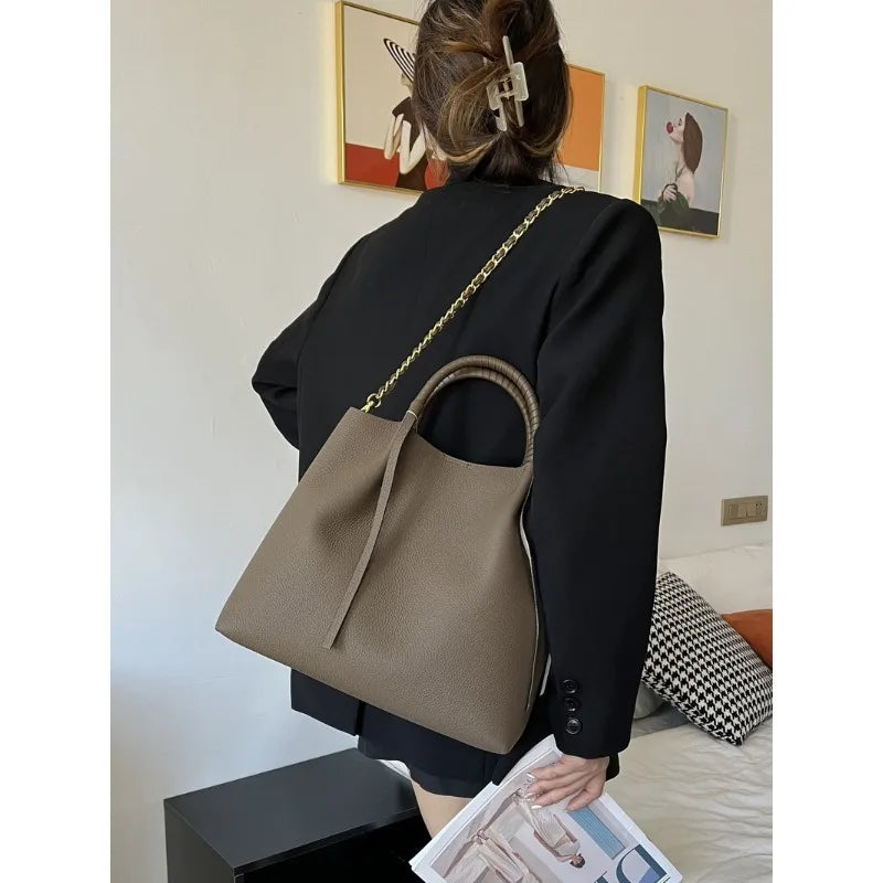 New Leather Women's Bag First Layer Cowhide Coarse Lychee Pattern Fringed Chain Large Empty Capacity Tote Portable Shoulder Bag