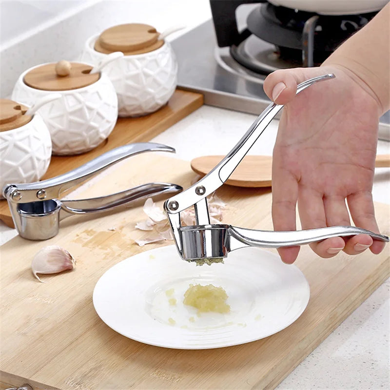 Manufacturer    Garlic Press Mincer Stainless Steel Multifunction Crusher Kitchen Cooking Ginger Squeezer Masher Handheld Ginger Mincer Tools     Kitchen gadgets