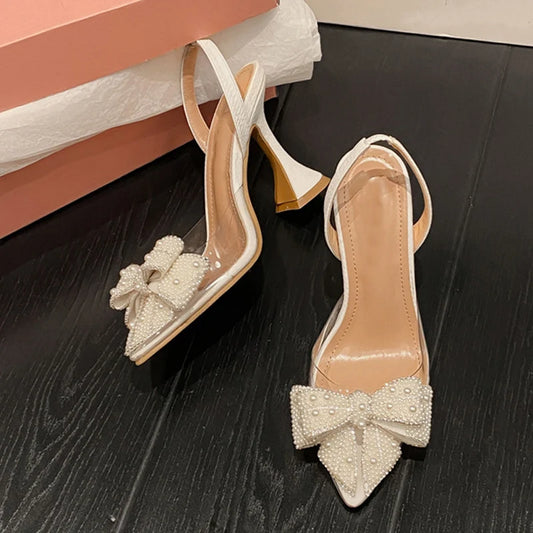 Manufacturer   Liyke Fashion Design White Pearl Bowknot Women Pumps Sexy Pointed Toe High Heels Wedding Prom Shoe PVC Transparent Sandal Female   Pumps