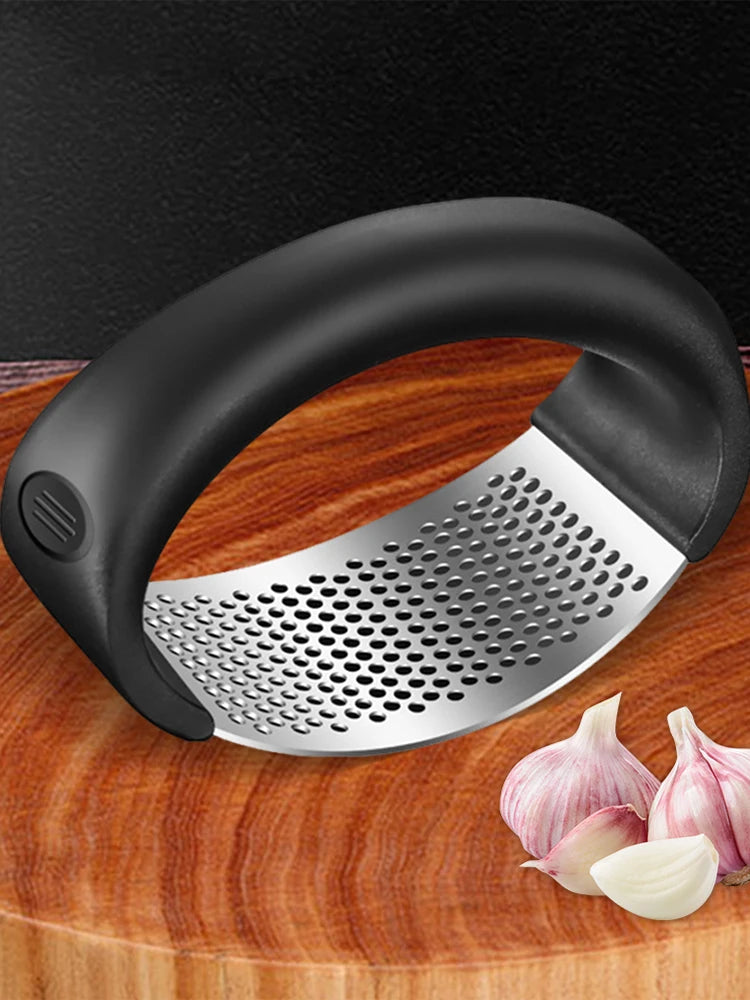 Manufacturer    Stainless Steel Garlic Masher Manual Garlic Chopper Curve Garlic Press Crusher for Fruit Vegetable Kitchen Gadget Accessories     Kitchen gadgets