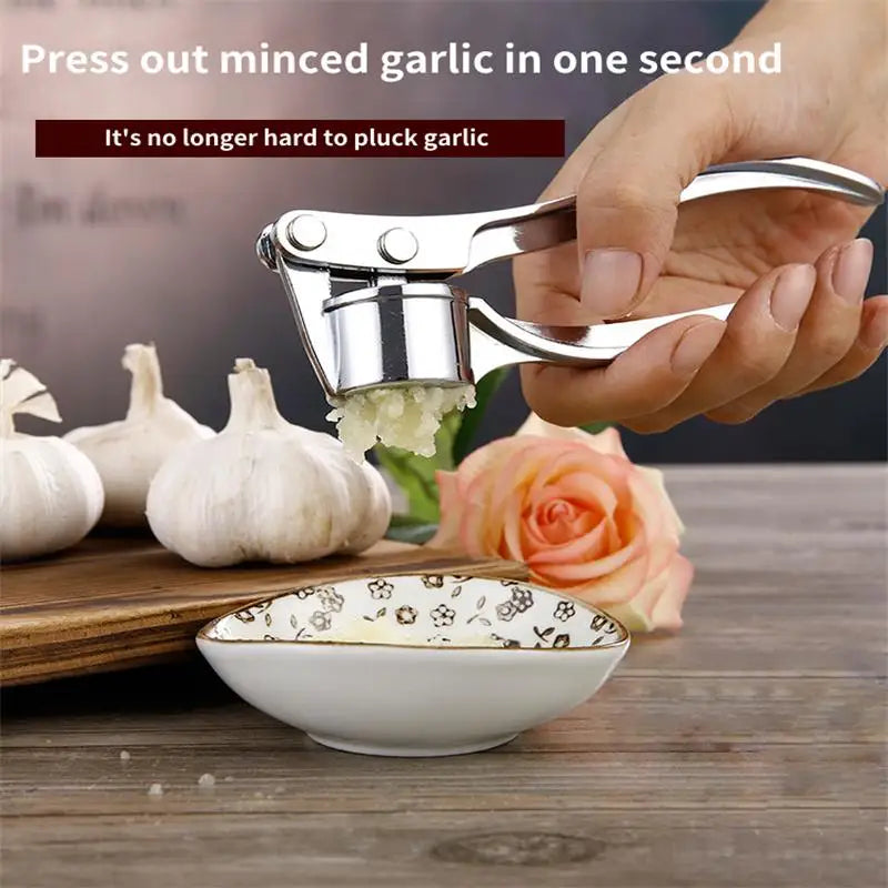 Manufacturer    Garlic Press Mincer Stainless Steel Multifunction Crusher Kitchen Cooking Ginger Squeezer Masher Handheld Ginger Mincer Tools     Kitchen gadgets