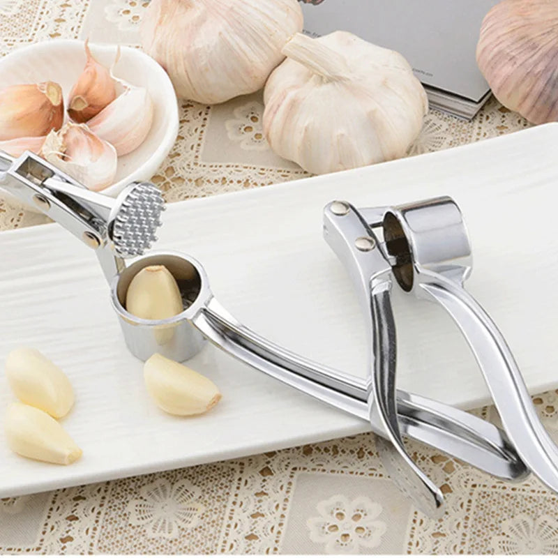 Manufacturer    Garlic Press Mincer Stainless Steel Multifunction Crusher Kitchen Cooking Ginger Squeezer Masher Handheld Ginger Mincer Tools     Kitchen gadgets