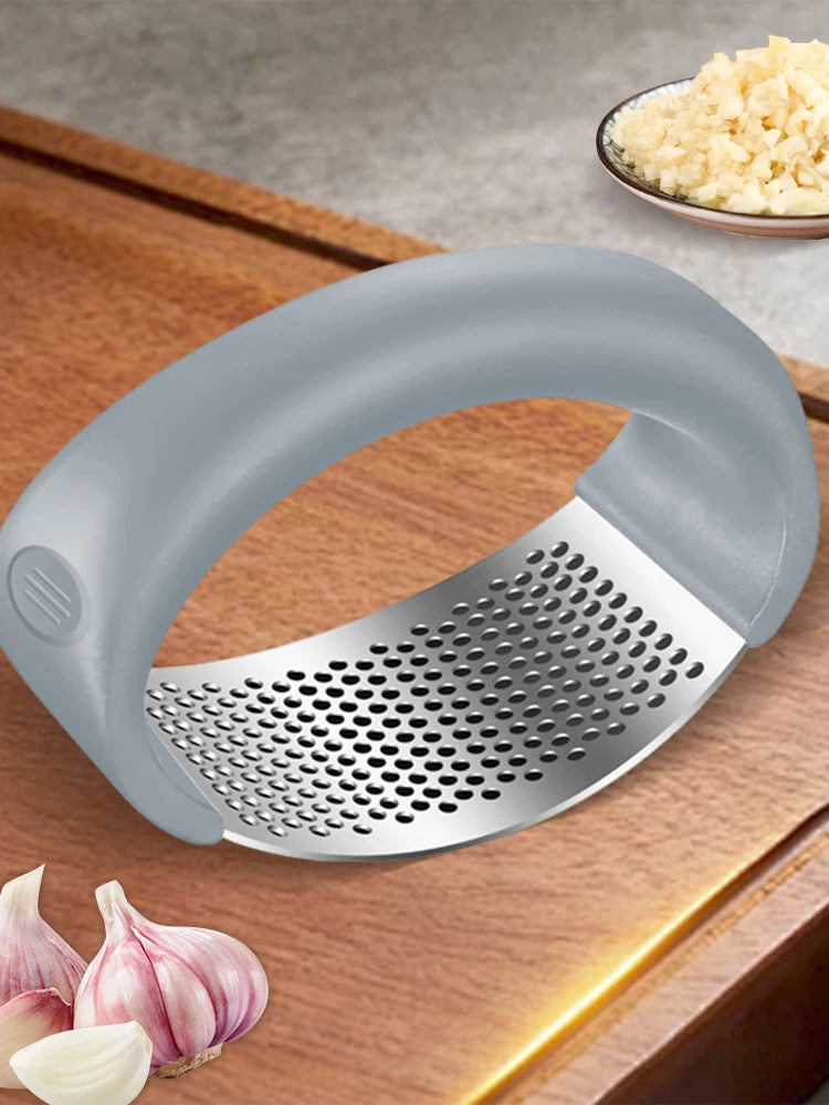 Manufacturer    Stainless Steel Garlic Masher Manual Garlic Chopper Curve Garlic Press Crusher for Fruit Vegetable Kitchen Gadget Accessories     Kitchen gadgets
